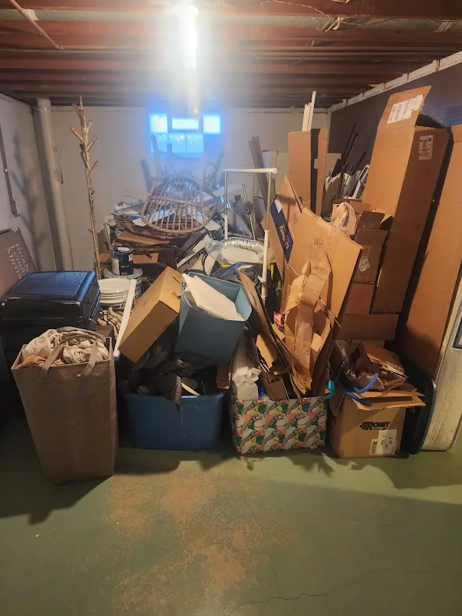 Roll-off dumpster container at job site for 2 Yard Dumpster Rental in Montgomery